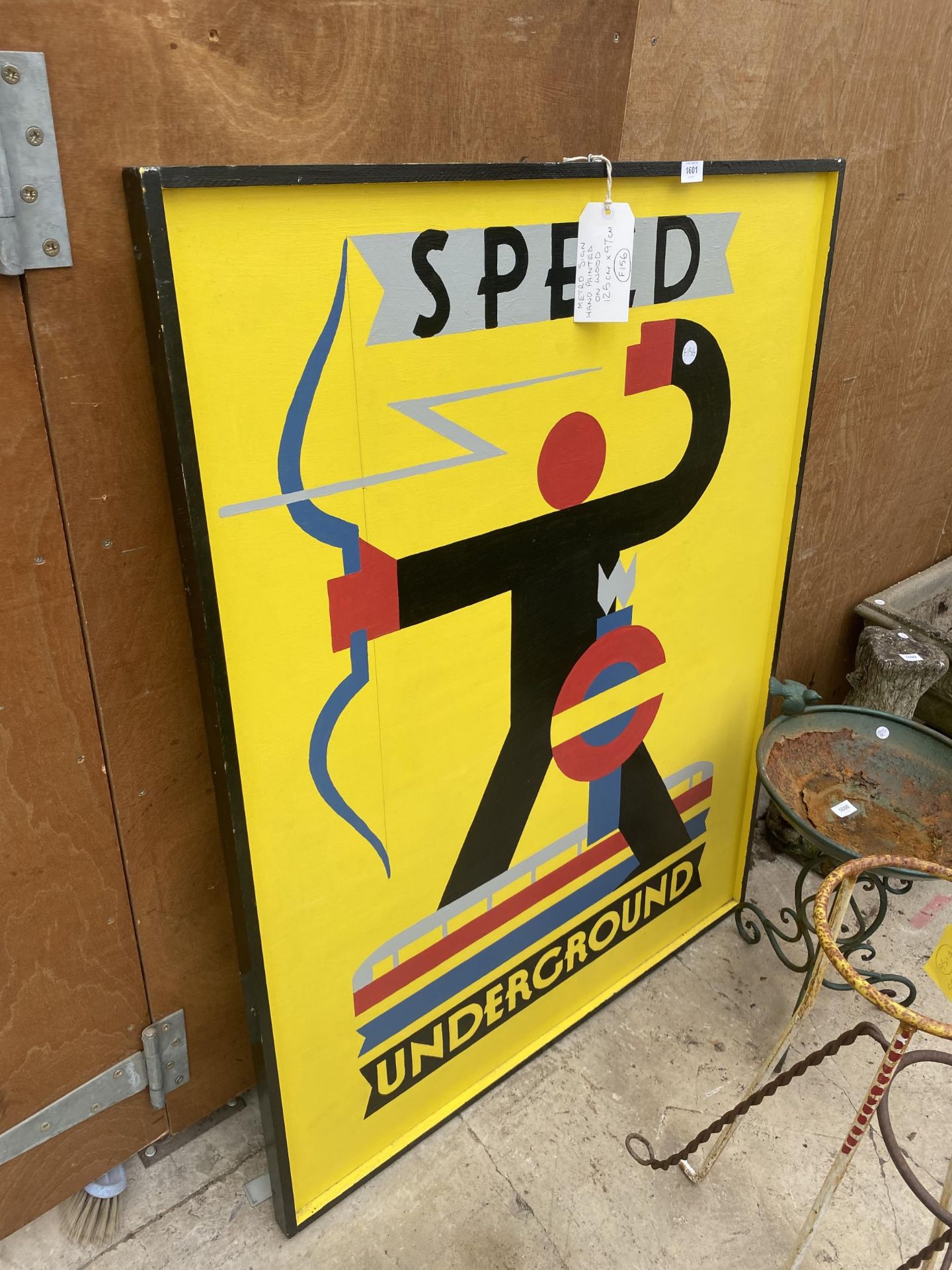 A HAND PAINTED 'METRO SPEED' SIGN (125CM x 97CM)