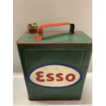 A VINTAGE ESSO PETROL CAN WITH BRASS TOP