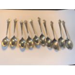 TEN SPOONS TO INCLUDE FIVE HALLMARKED BIRMINGHAM AND FIVE EPNS GORSS WEIGHT OF SILVER SPOONS 63.6