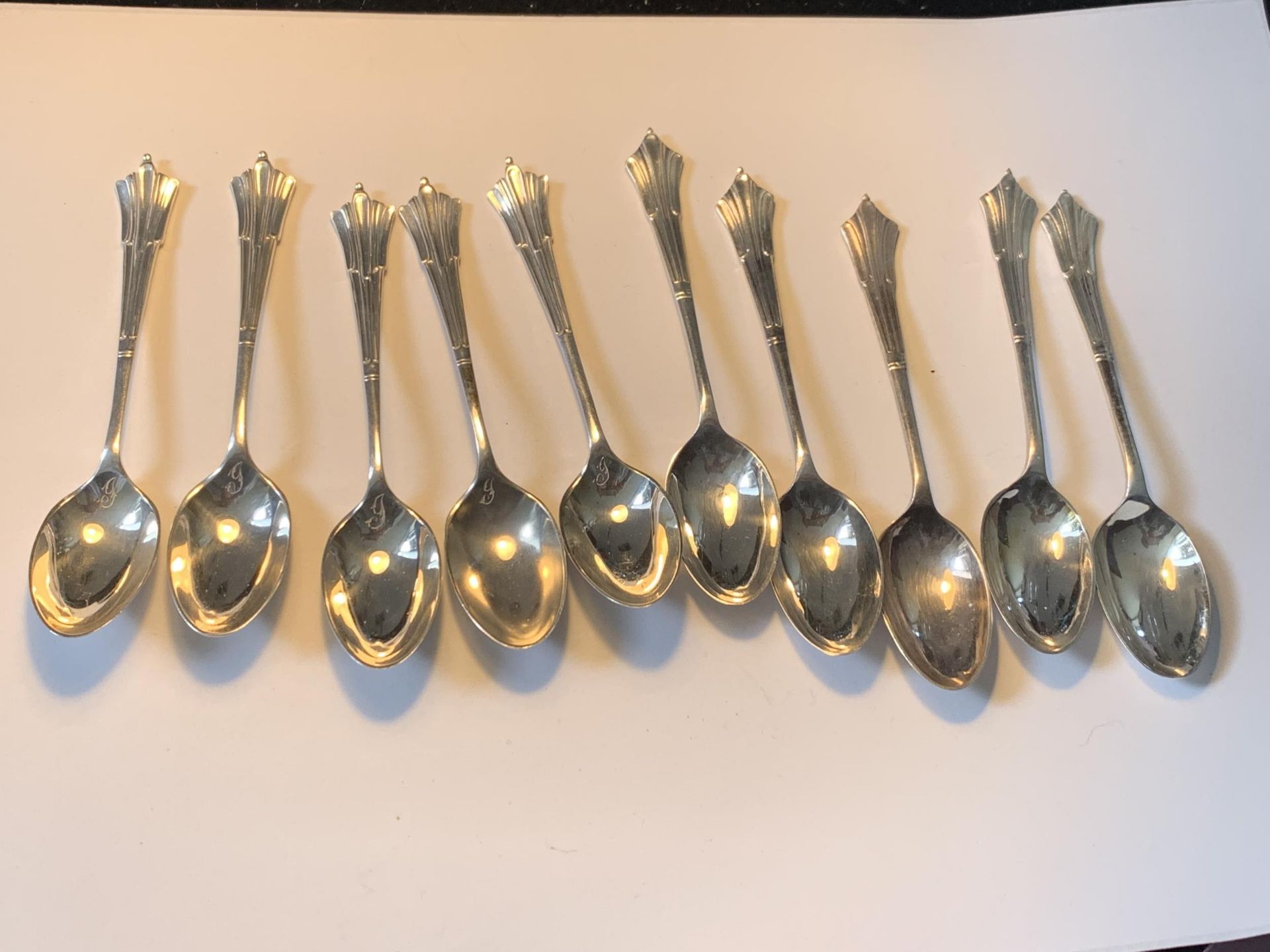 TEN SPOONS TO INCLUDE FIVE HALLMARKED BIRMINGHAM AND FIVE EPNS GORSS WEIGHT OF SILVER SPOONS 63.6