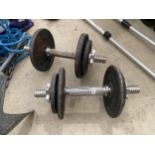 A PAIR OF METAL DUMB BELL WEIGHTS