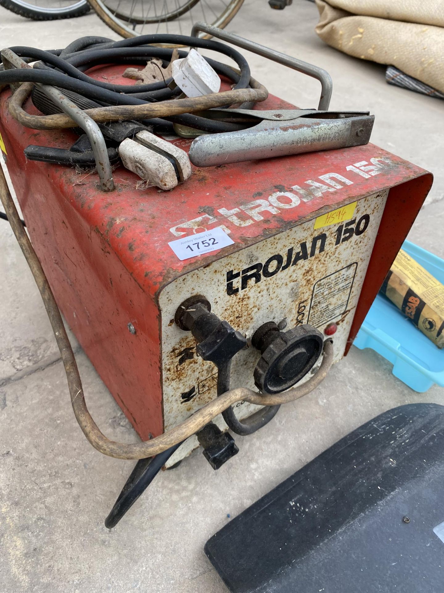 A TROJAN 150 ARC WELDER WITH A WELDING MASK AND WELDING RODS - Image 2 of 2