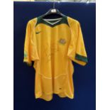 A SIGNED AUSTRALIAN FOOTBALL SHIRT SIGNED BY MARK BRESCIANO