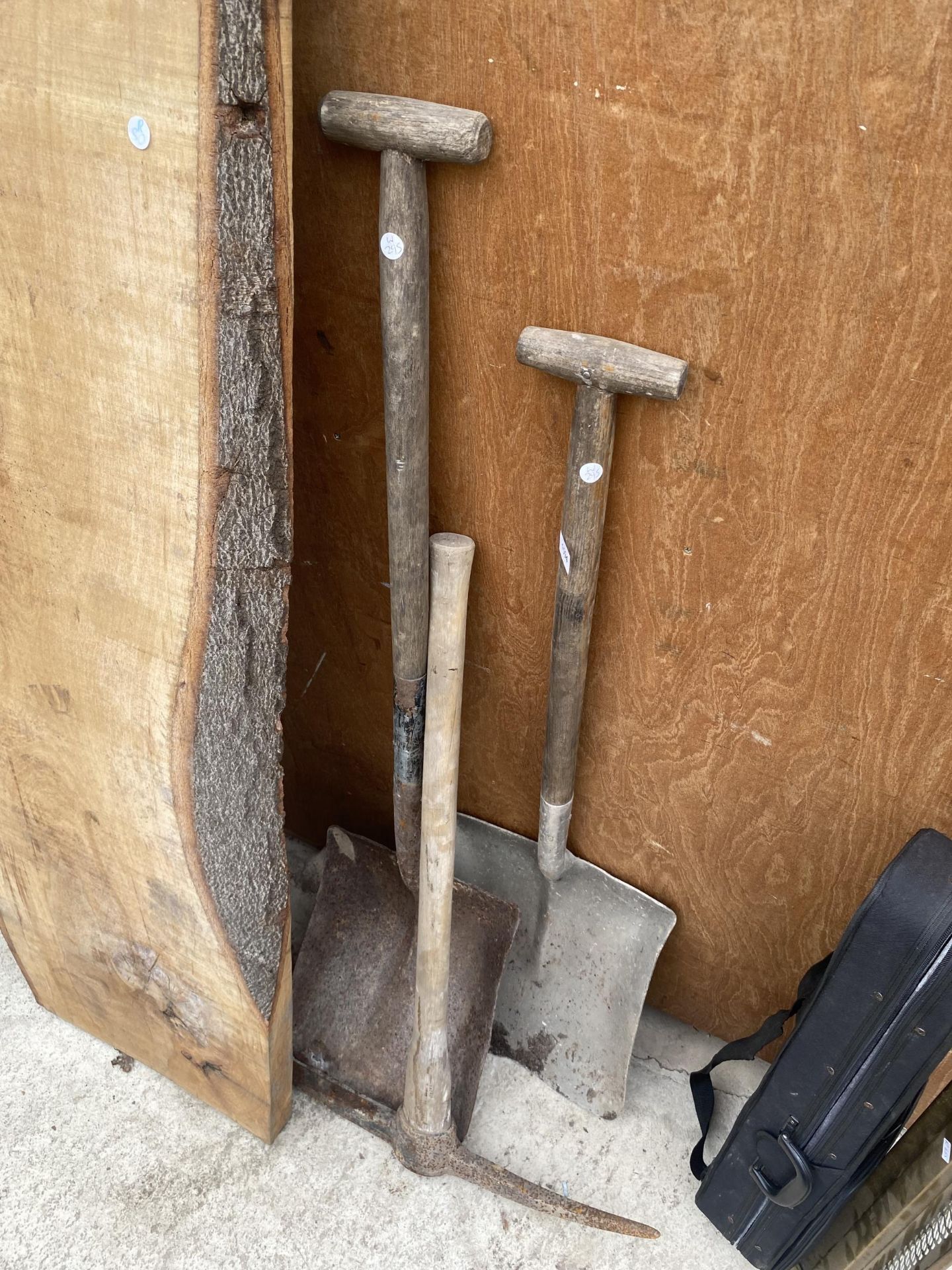 TWO VINTAGE SHOVELS AND A PICK AXE