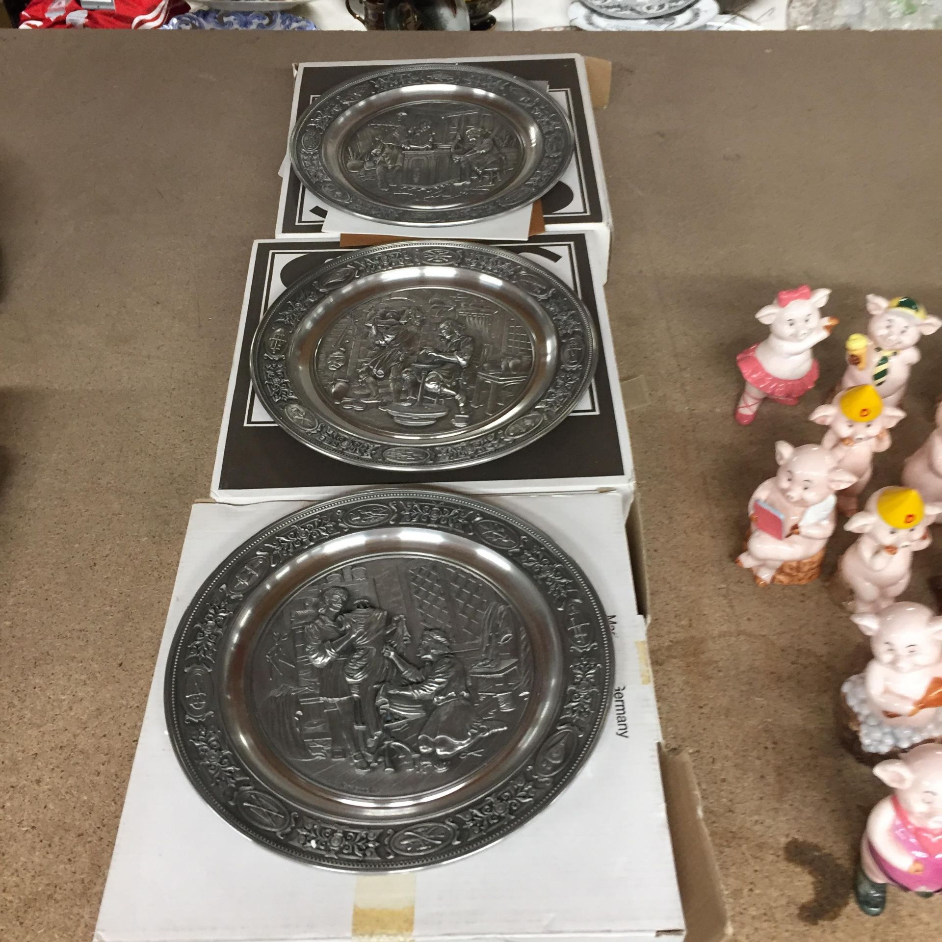 THREE BOXED PEWTER EFFECT COLLECTABLE PLATES