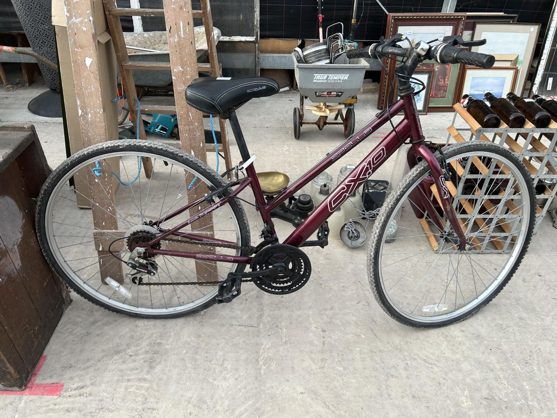 AN APOLLO CX10 LADIES BIKE WITH 18 SPEED SHIMANO GEAR SYSTEM