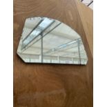 A DOMED ART DECO UNFRAMED BEVELED EDGE WALL MIRROR