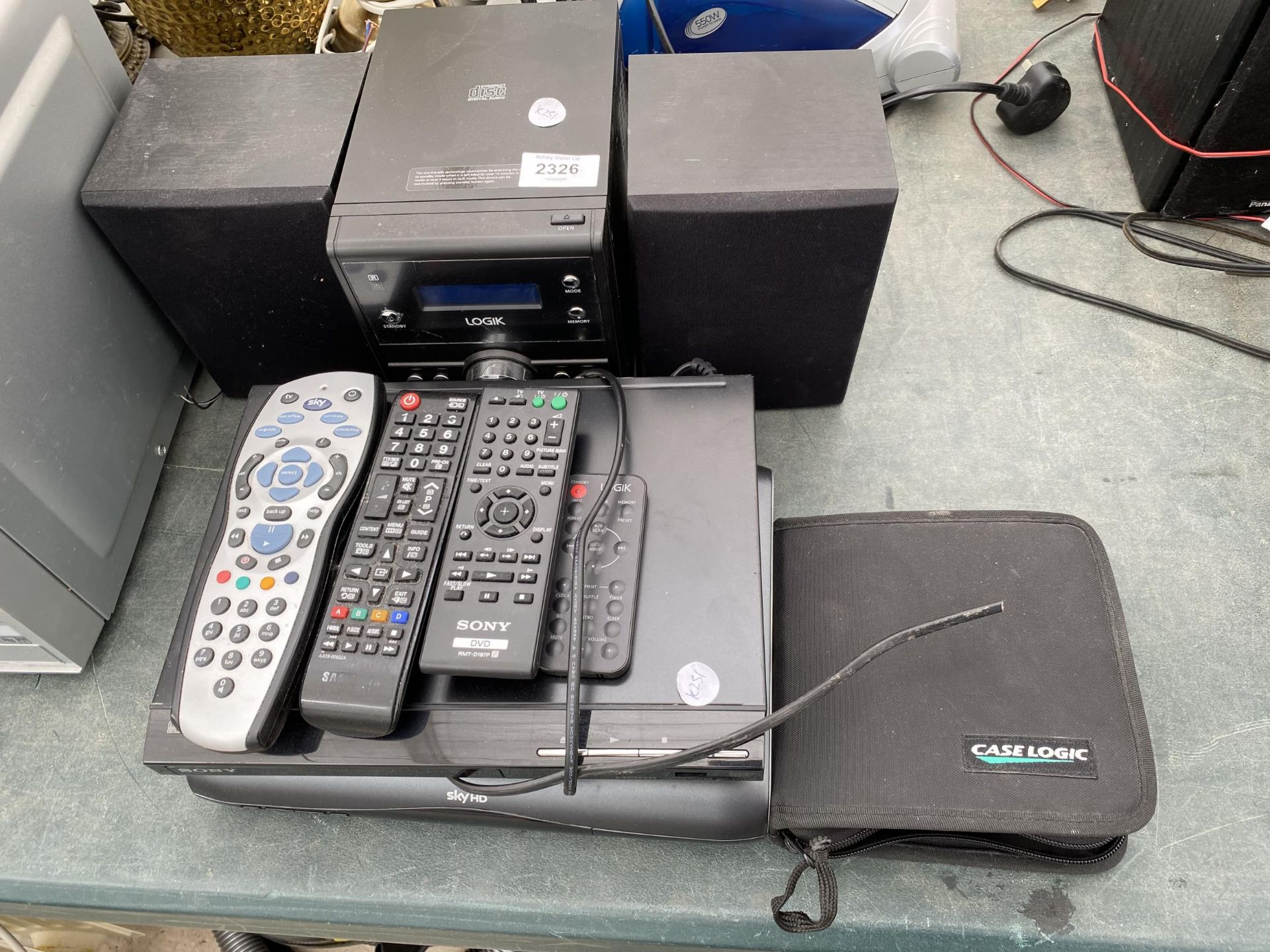 AN ASSORTMENT OF ITEMS TO INCLUDE A LOGIK STEREO SYSTEM AND A SONY DVD PLAYER ETC