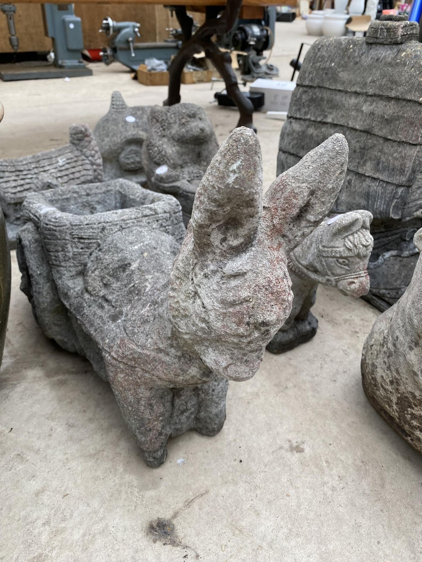 AN ASSORTMENT OF RECONSTITUTED STONE GARDEN ORNAMENTS TO INCLUDE BOOTS, COTTAGES AND PLANTERS ETC - Image 2 of 3