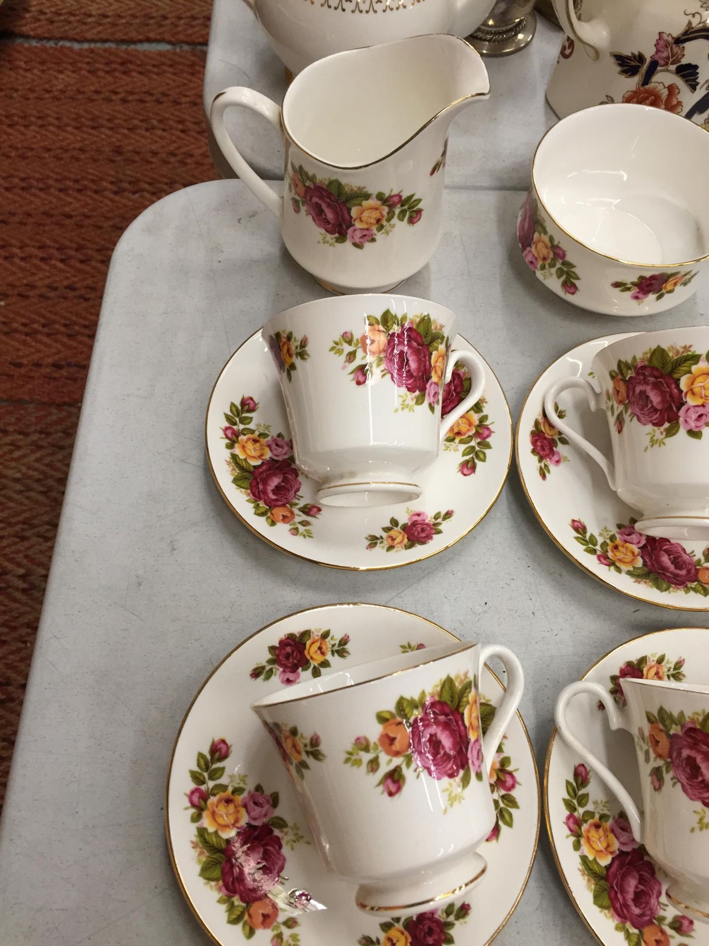 A QUANTITY OF TEAWARE TO INCLUDE ROYAL IMPERIAL CUPS, SAUCERS AND CREAM JUG, PLUS COUNTRY ROSE STYLE - Image 2 of 8