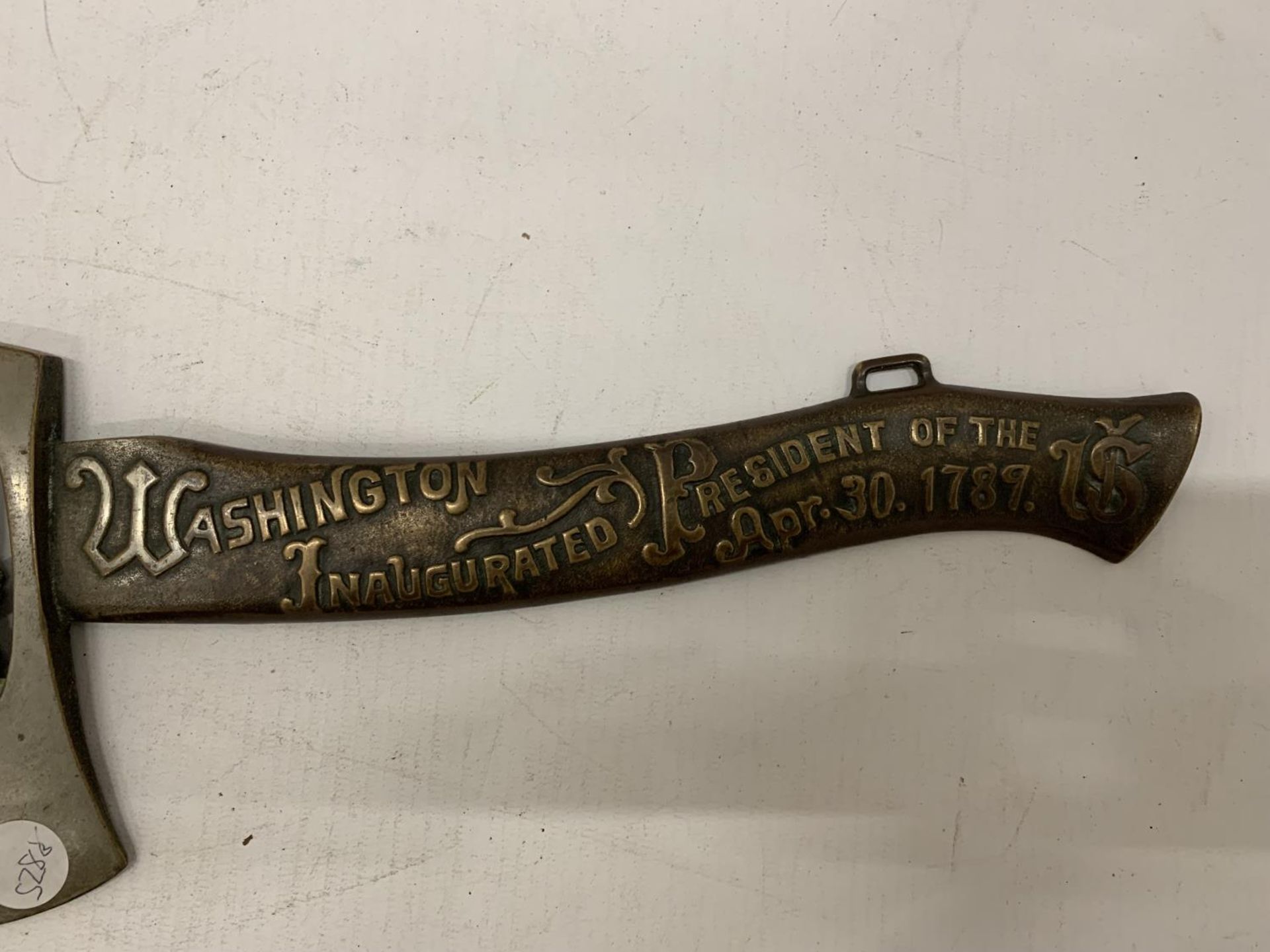 A METAL AXE WITH AN IMAGE OF GEORGE WASHINGTON, INSCRIBED 'WASHINGTON INAUGURATED PRESIDENT OF THE - Image 3 of 5