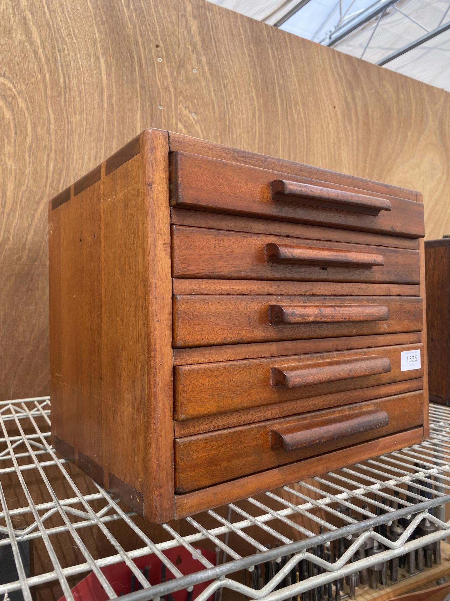 A VINTAGE FIVE DRAWER MINIATURE ENGINEERS CHEST