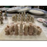 A MARBLE STYLE CHESS BOARD AND PIECES - 1 A/F