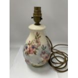 A MOORCROFT POTTERY LAMP DECORATED IN THE 'SPRING BLOSSOM' PATTERN BY DESIGNER SALLY TUFFIN