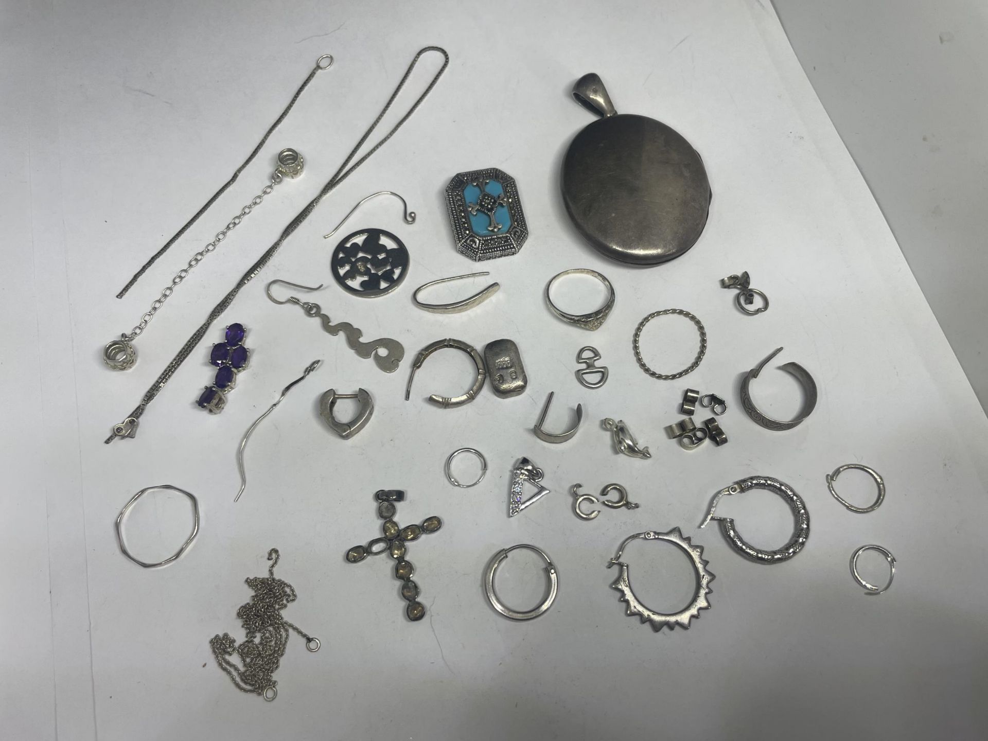 SCRAP SILVER ITEMS GROSS WEIGHT 58 GRAMS