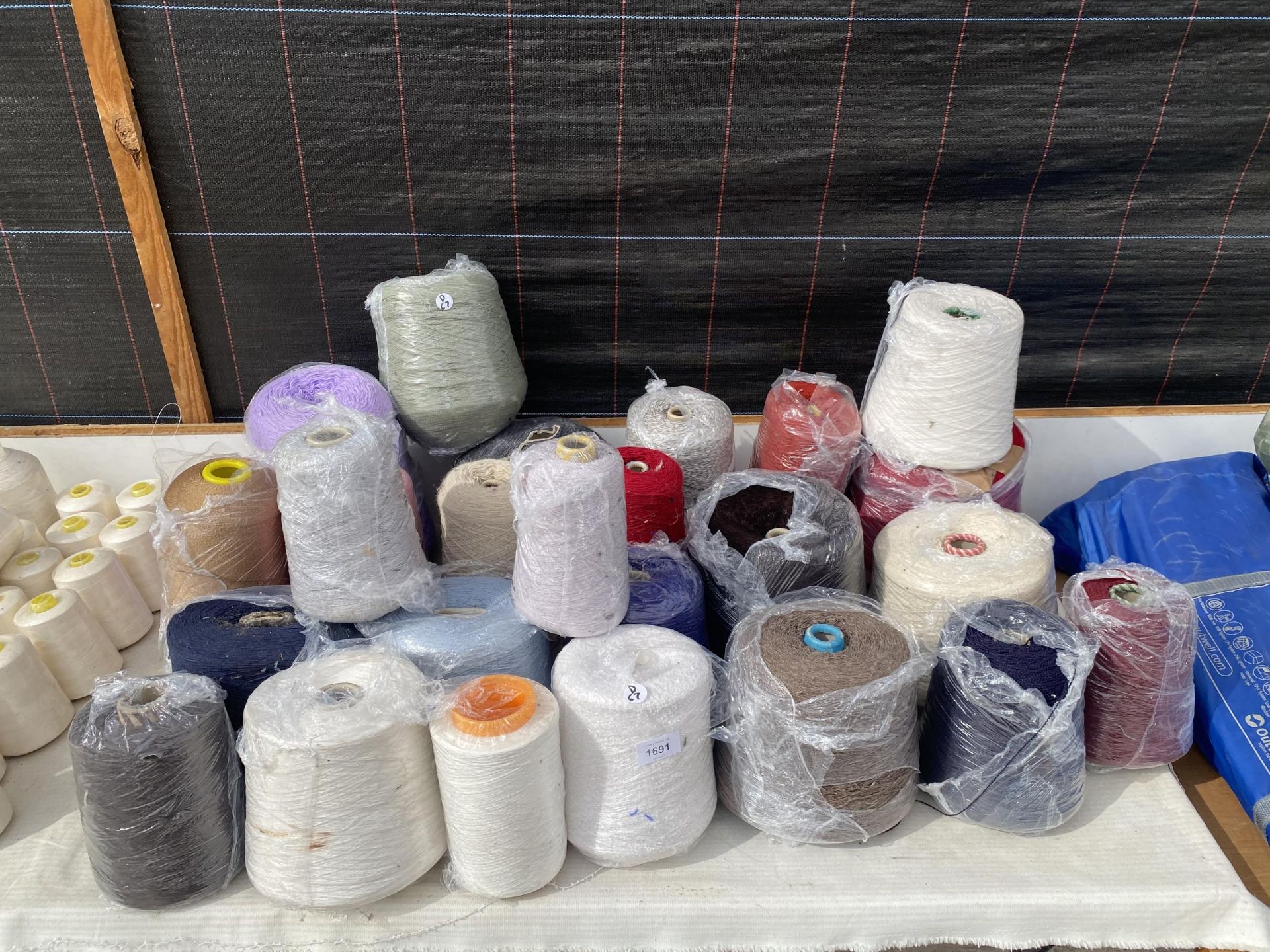 A LARGE QUANTITY OF INDUSTRIAL SEWING MACHINE COTTON