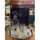 AN EDINBURGH CRYSTAL WHISKY DECANTER, FOUR WHISKY GLASSES AND A SILVER PLATED TRAY - BOXED