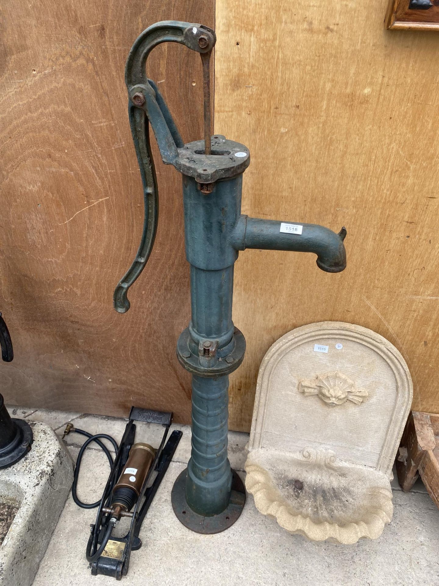 A VINTAGE CAST IRON WELL WATER PUMP