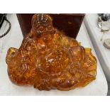 AN ORIENTAL AMBER EFFECT MODEL OF A BUDDHA