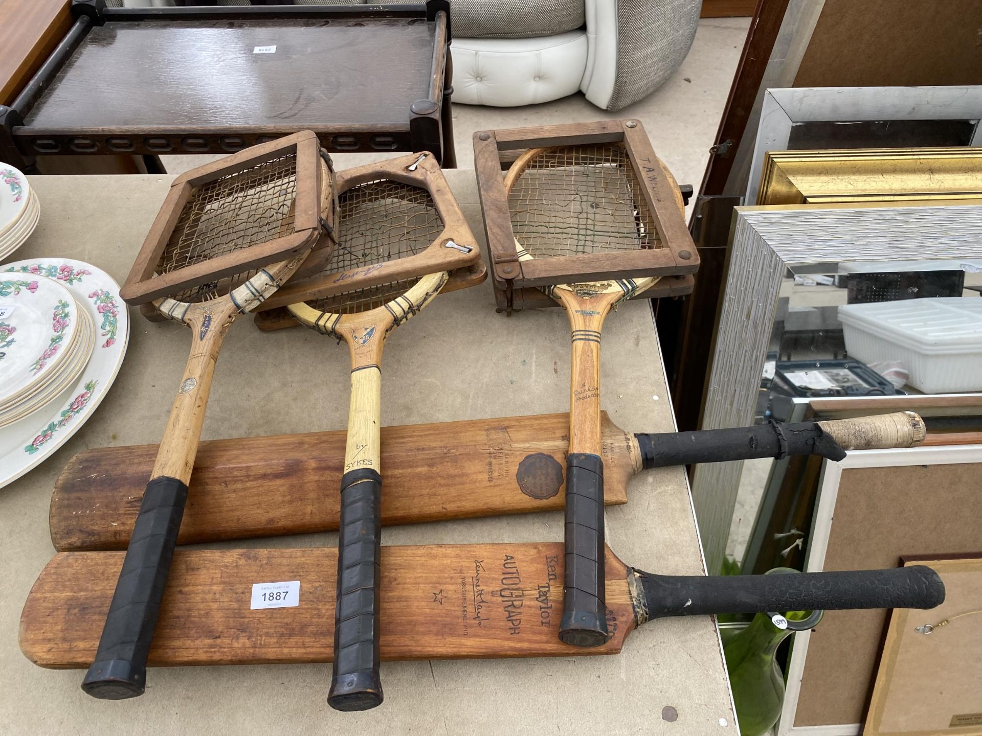 THREE VINTAGE TENNIS RACKETS AND TWO VINTAGE CRICKET BATS