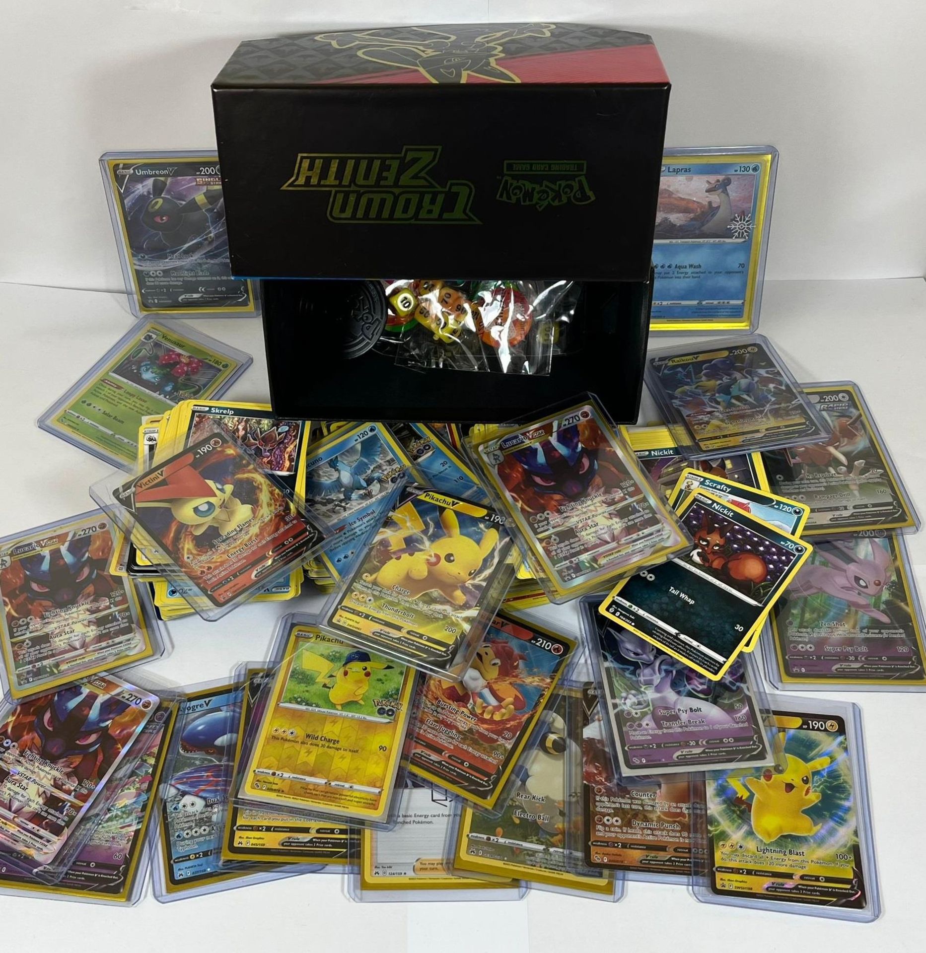 A LARGE COLLECTION OF APPROXIMATELY 350 POKEMON CARDS IN A TRAINER BOX, V CARDS, HOLOS ETC