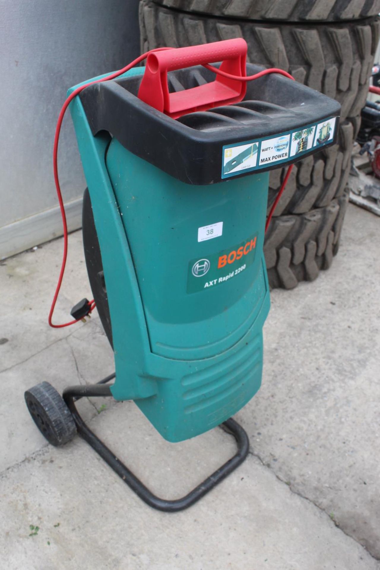 AN ELECTRIC BOSCH AXT RAPID 2200 GARDEN SHREDDER BELIEVED IN WORKING ORDER BUT NO WARRANTY GIVEN