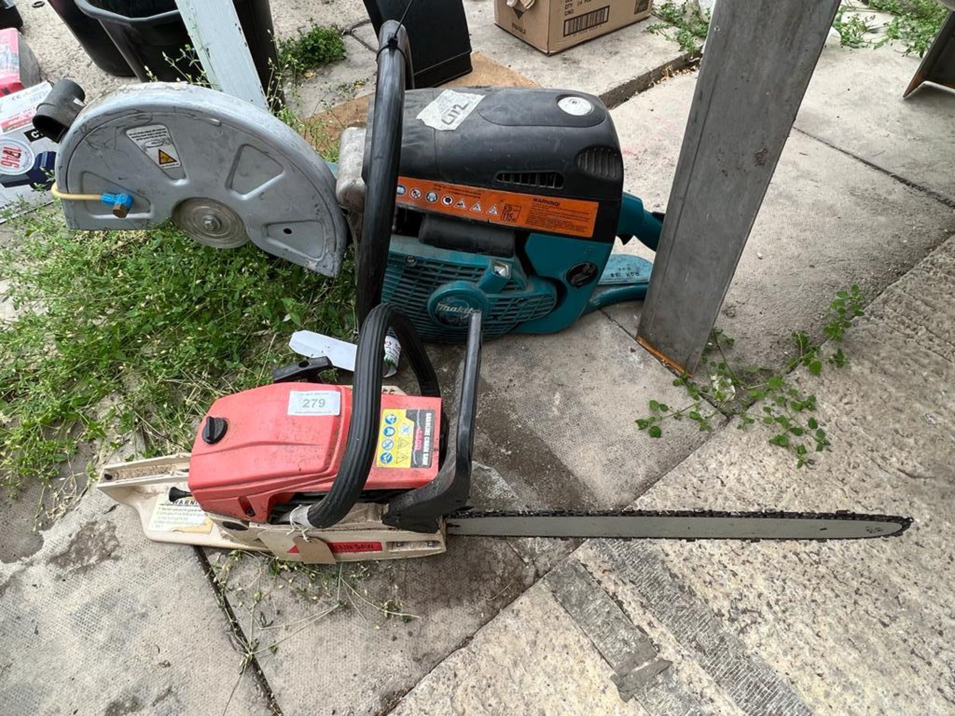 A MAKITA STONE SAW & A UNNAMED CHAINSAW NO VAT