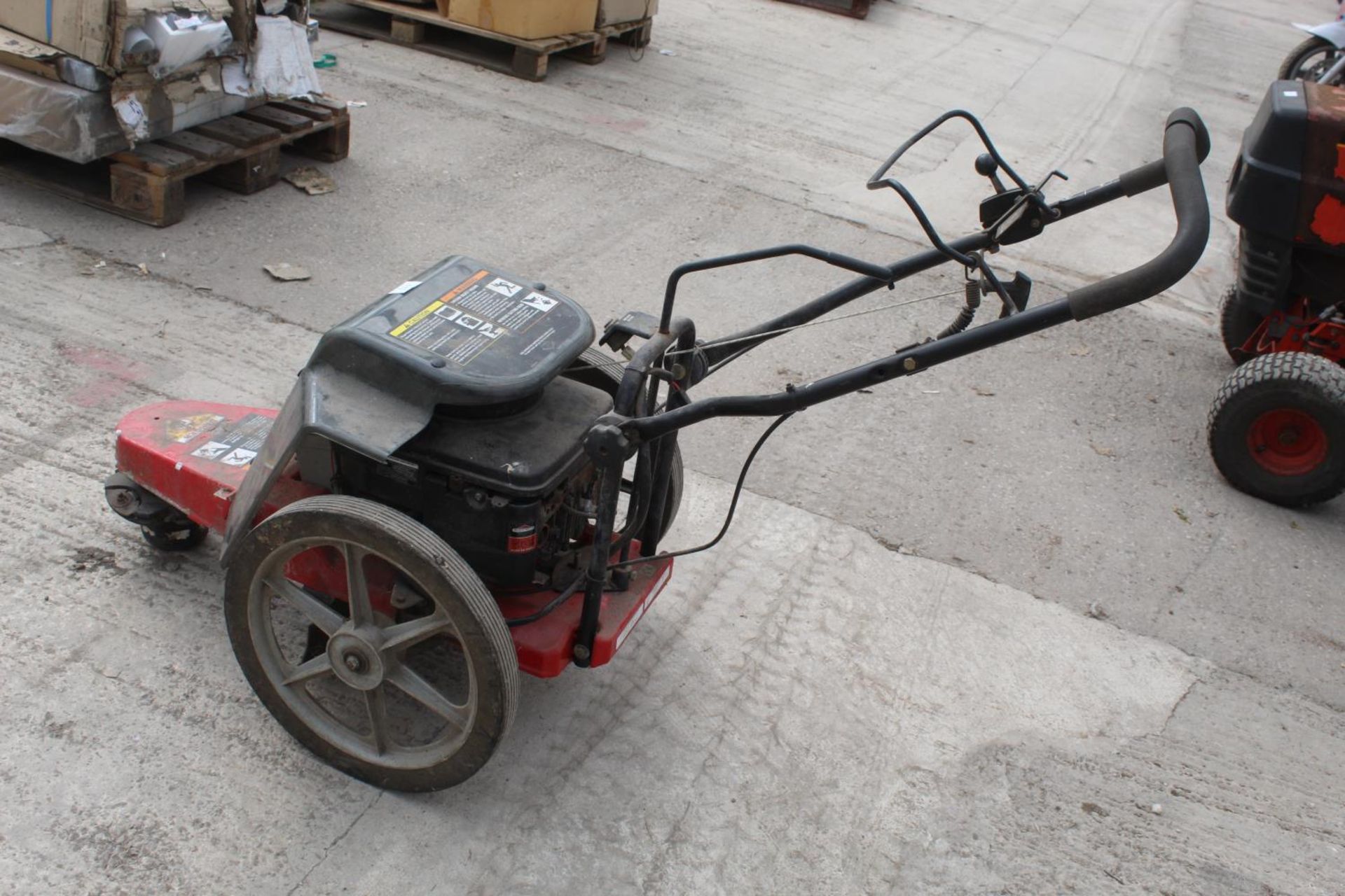 A TROY-BILT PETROL TRIMMER/MOWER BELIEVED IN WORKING ORDER BUT NO WARRANTY GIVEN NO-VAT