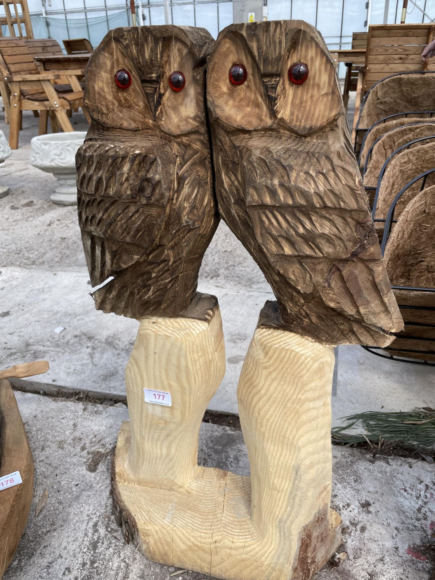 A PAIR OF OWLS WOOD CARVING APPROXIMATELY 75CM TALL