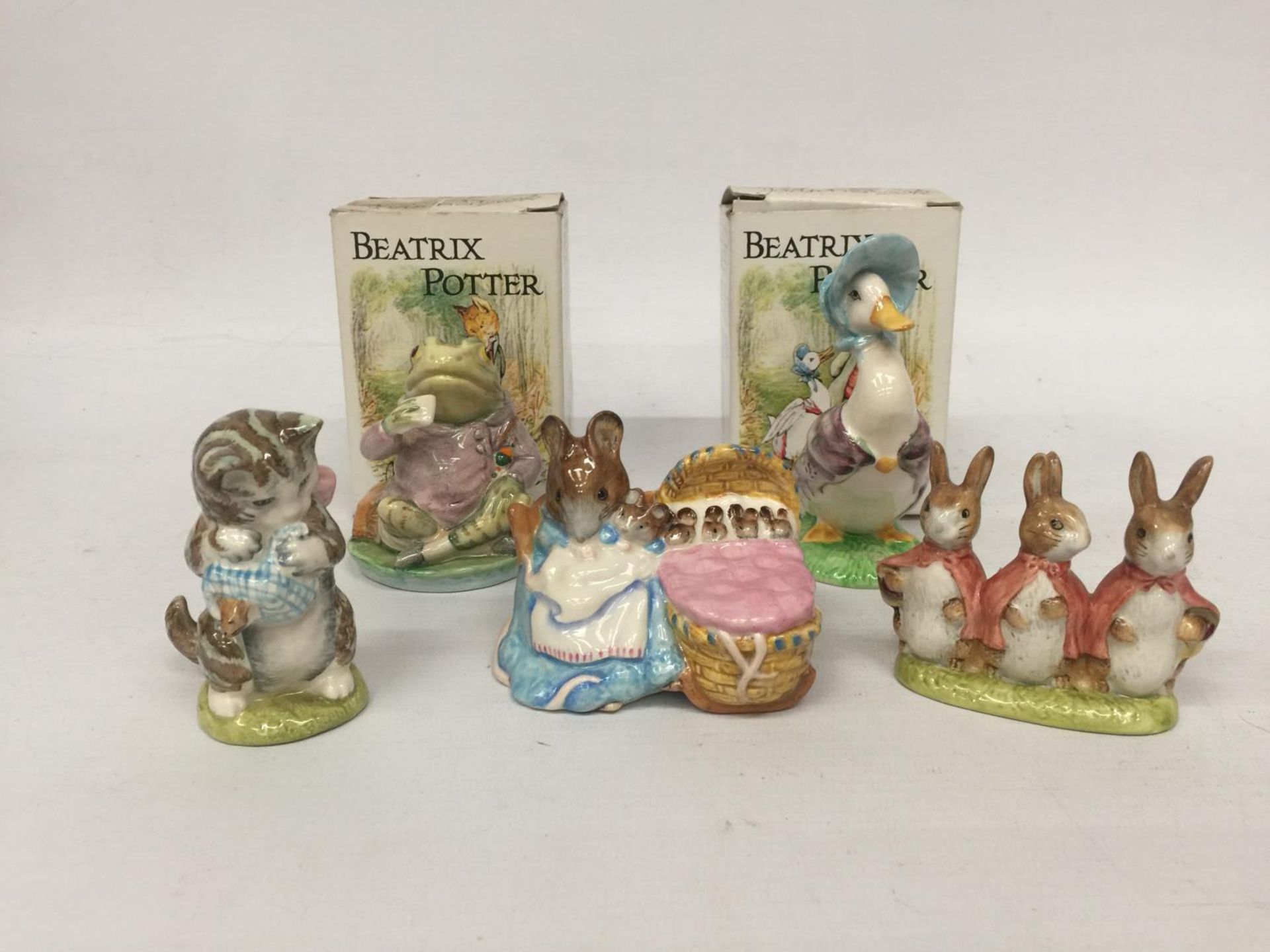 FIVE BESWICK BEATRIX POTTER FIGURES TO INCLUDE MISS MOPPET, JEREMY FISHER, MUNCO MUNCO, FLOPSY MOPSY