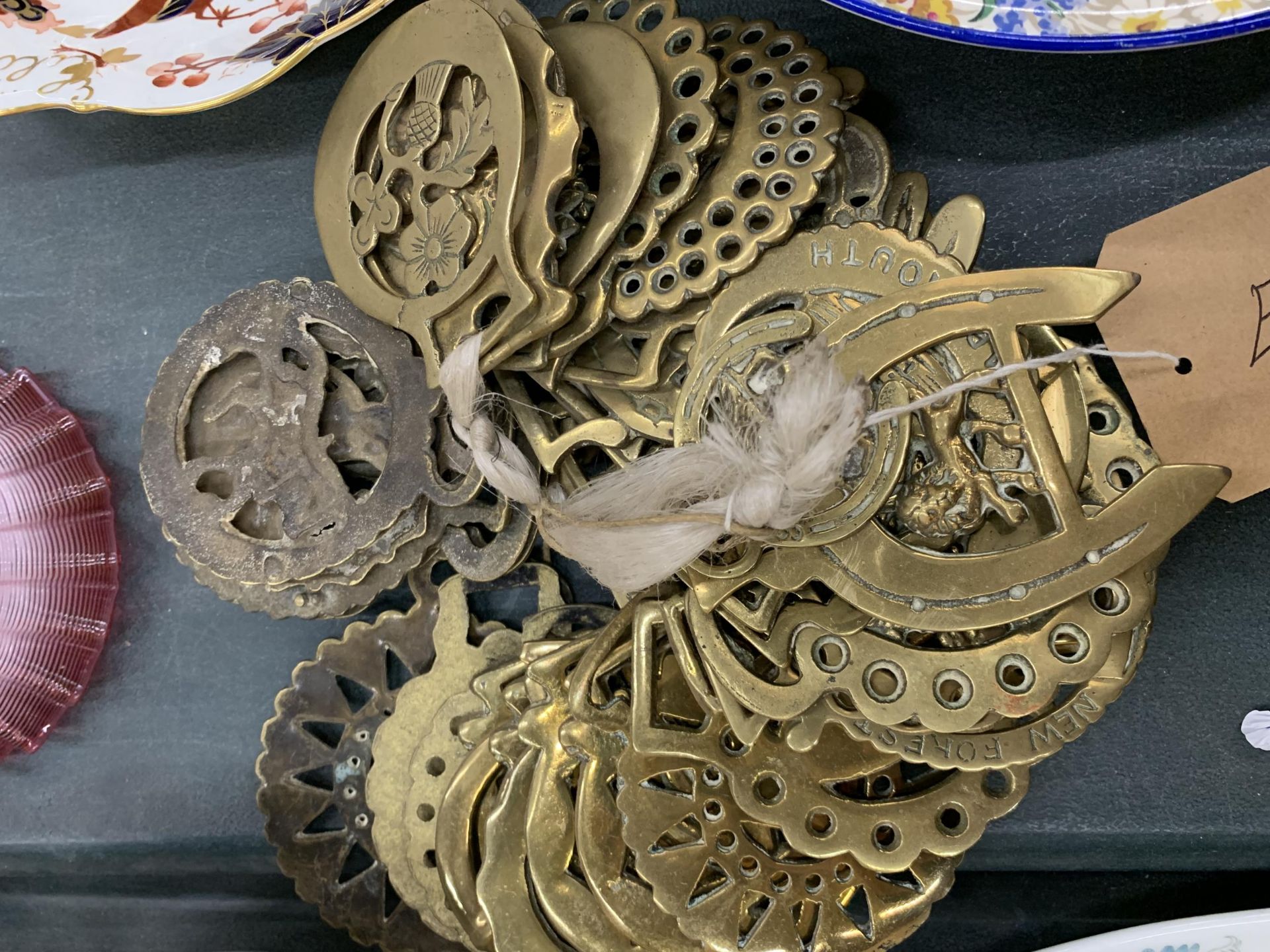 A COLLECTION OF VINTAGE HORSE BRASSES