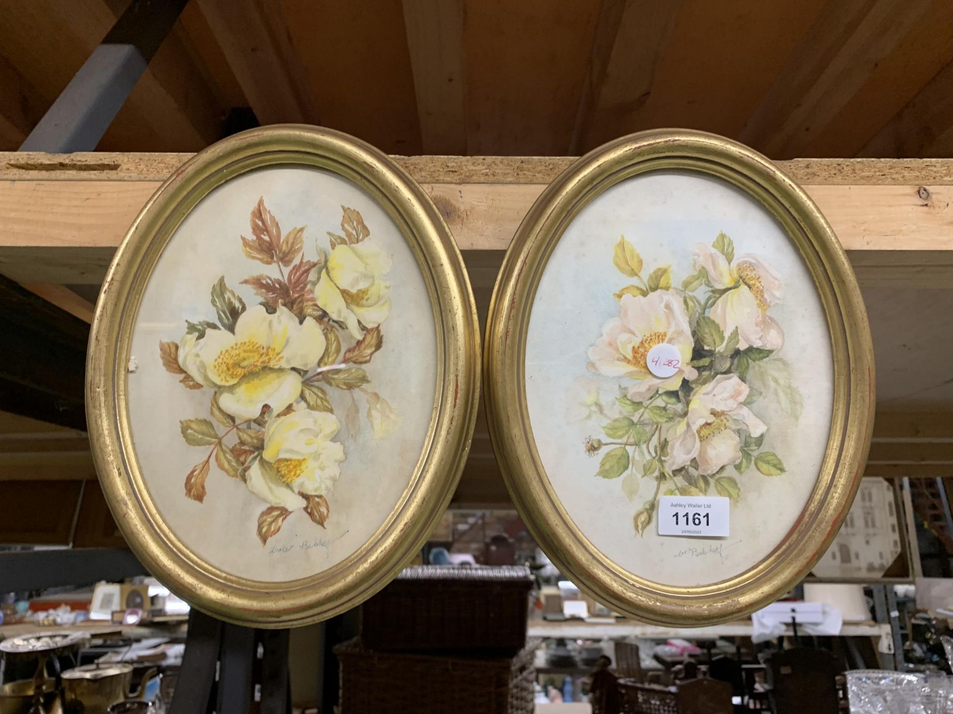 A PAIR OF VINTAGE FLORAL WATERCOLOURS, INDISTINCTLY SIGNED - W BOBBY