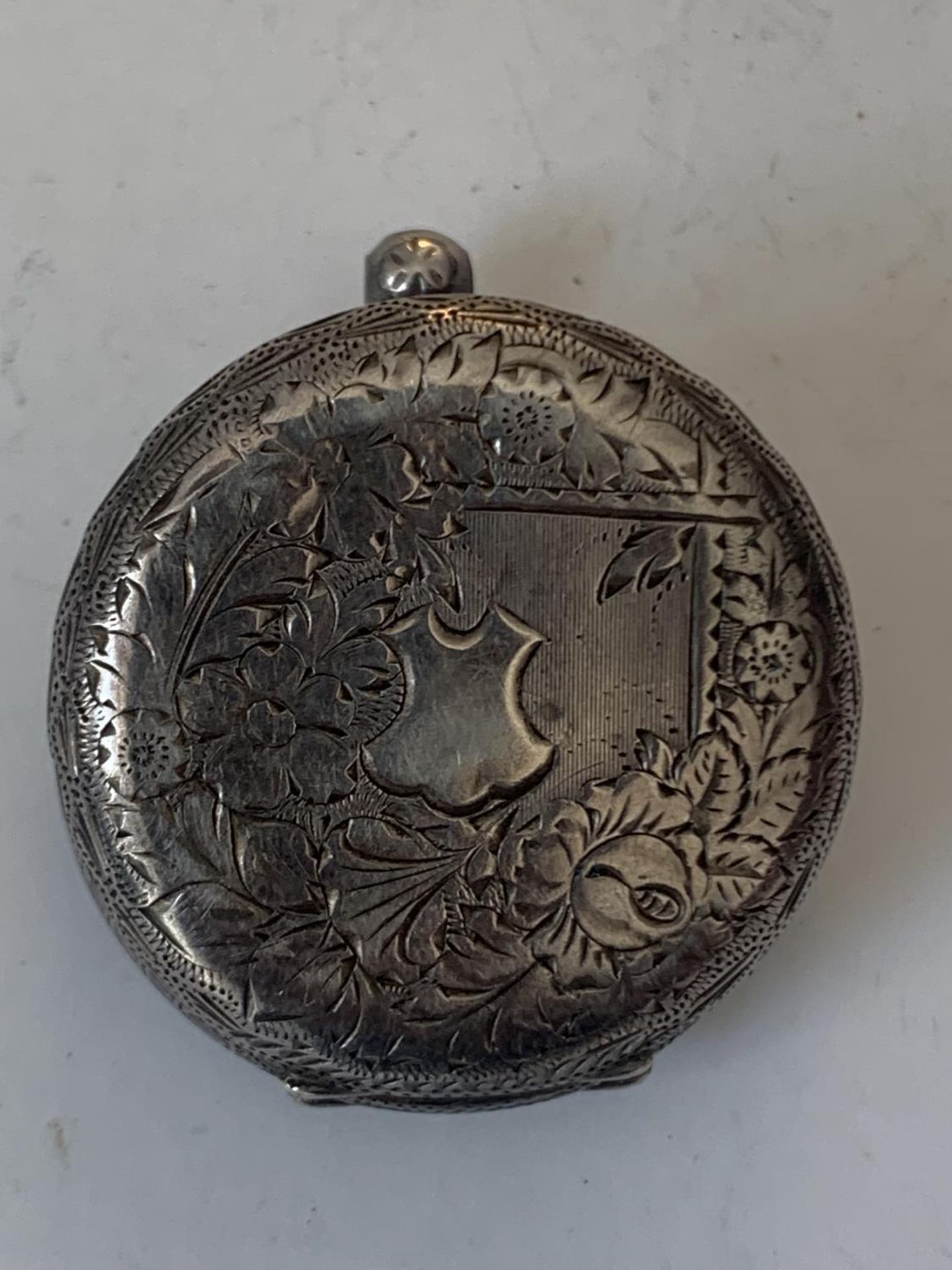 A MARKED 935 SILVER POCKET WATCH WITH WHITE ENAMEL AND FLORAL DECORATION FACE AND ROMAN NUMERALS ( - Image 2 of 3