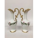 A PAIR OF LIMOGES PORCELAIN FLORAL JUGS