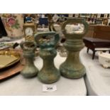 A SET OF THREE VINTAGE BRASS WEIGHTS