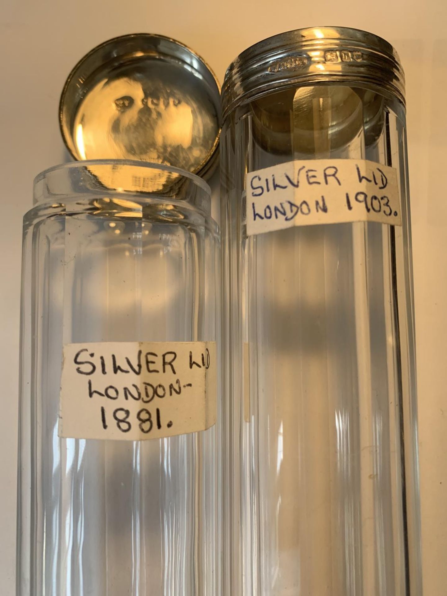 THREE GLASS POTS WITH HALLMARKED SILVER LIDS ONE LONDON 1881, ONE LONDON 1903 AND THE OTHER - Image 2 of 4