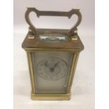 A FRENCH ANTIQUE BRASS CASED CARRIAGE CLOCK WITH KEY