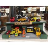 A PLANT HIRE GARAGE WITH TWELVE VARIOUS VEHICLES AND MACHINES