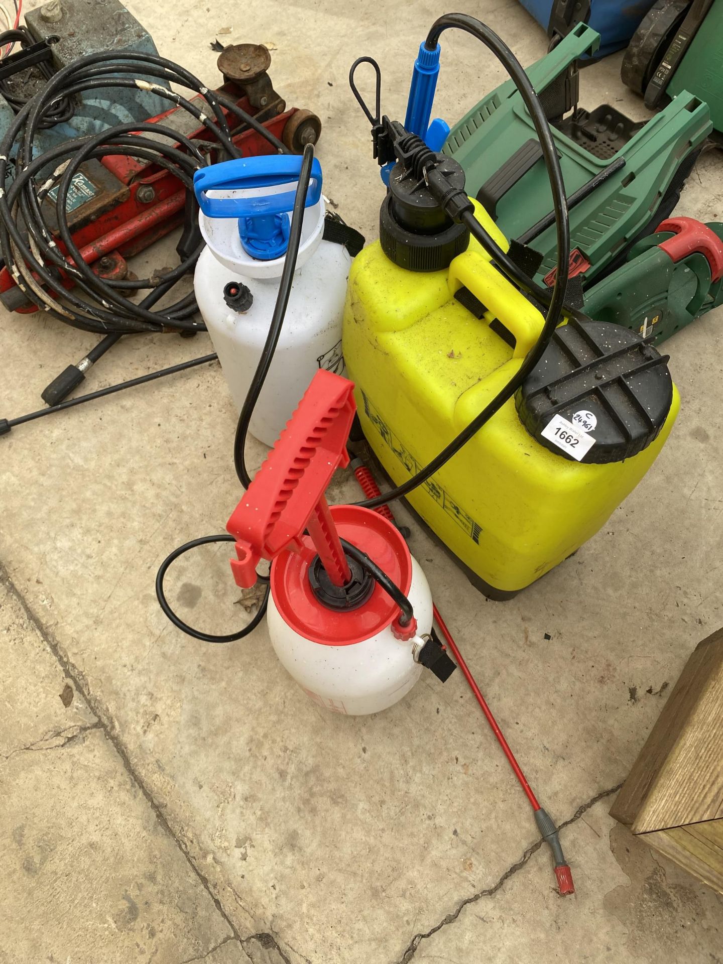 A GROUP OF GARDEN SPRAYERS