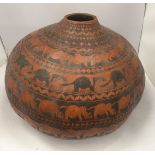 AN AFRICAN CALABASH WATER CONTAINER, LENGTH 40CM