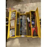 A YELLOW METAL CONCERTINA TOOL CHEST WITH ASSORTED TOOLS