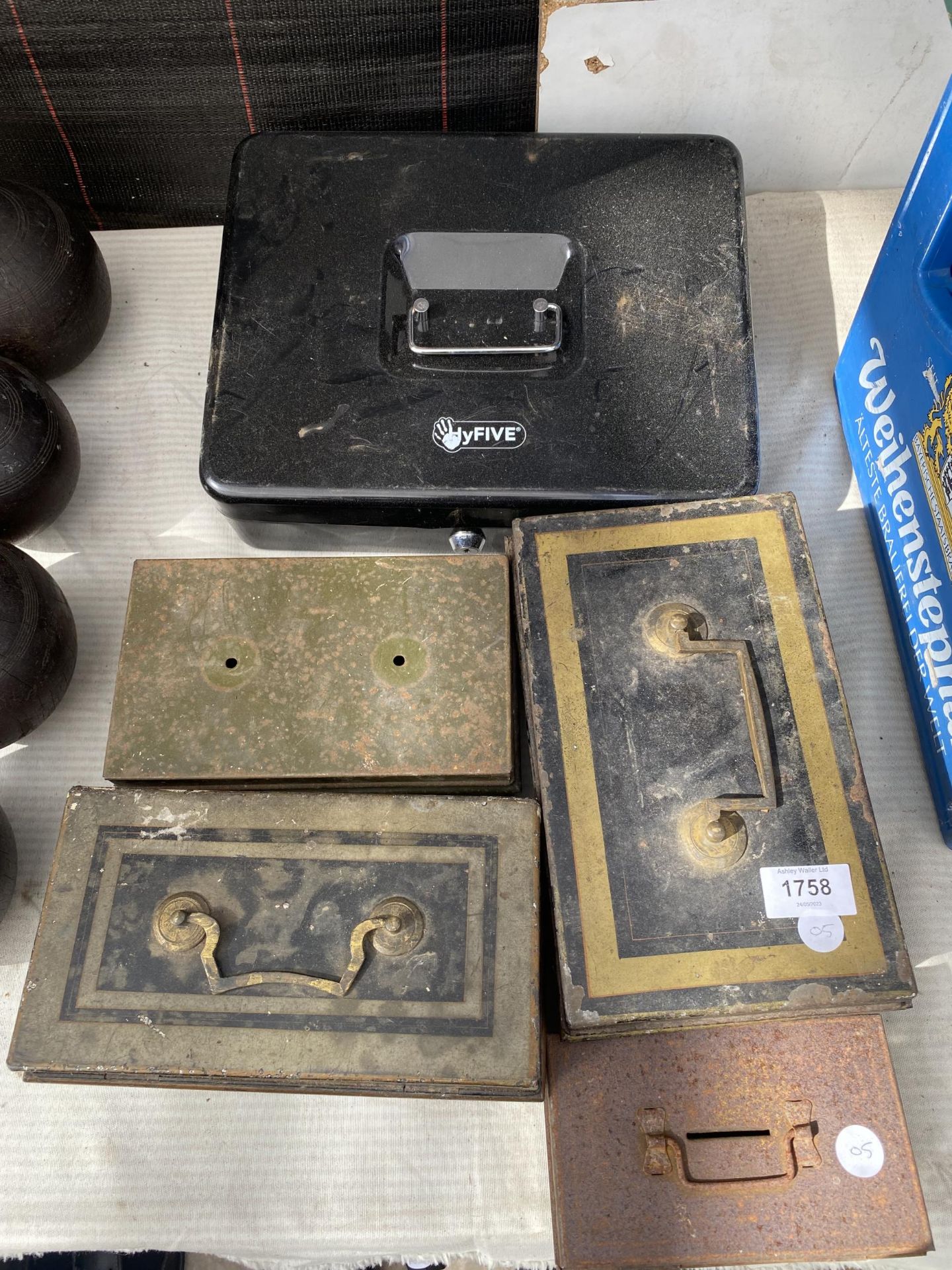 A GROUP OF VINTAGE METAL CASH TINS