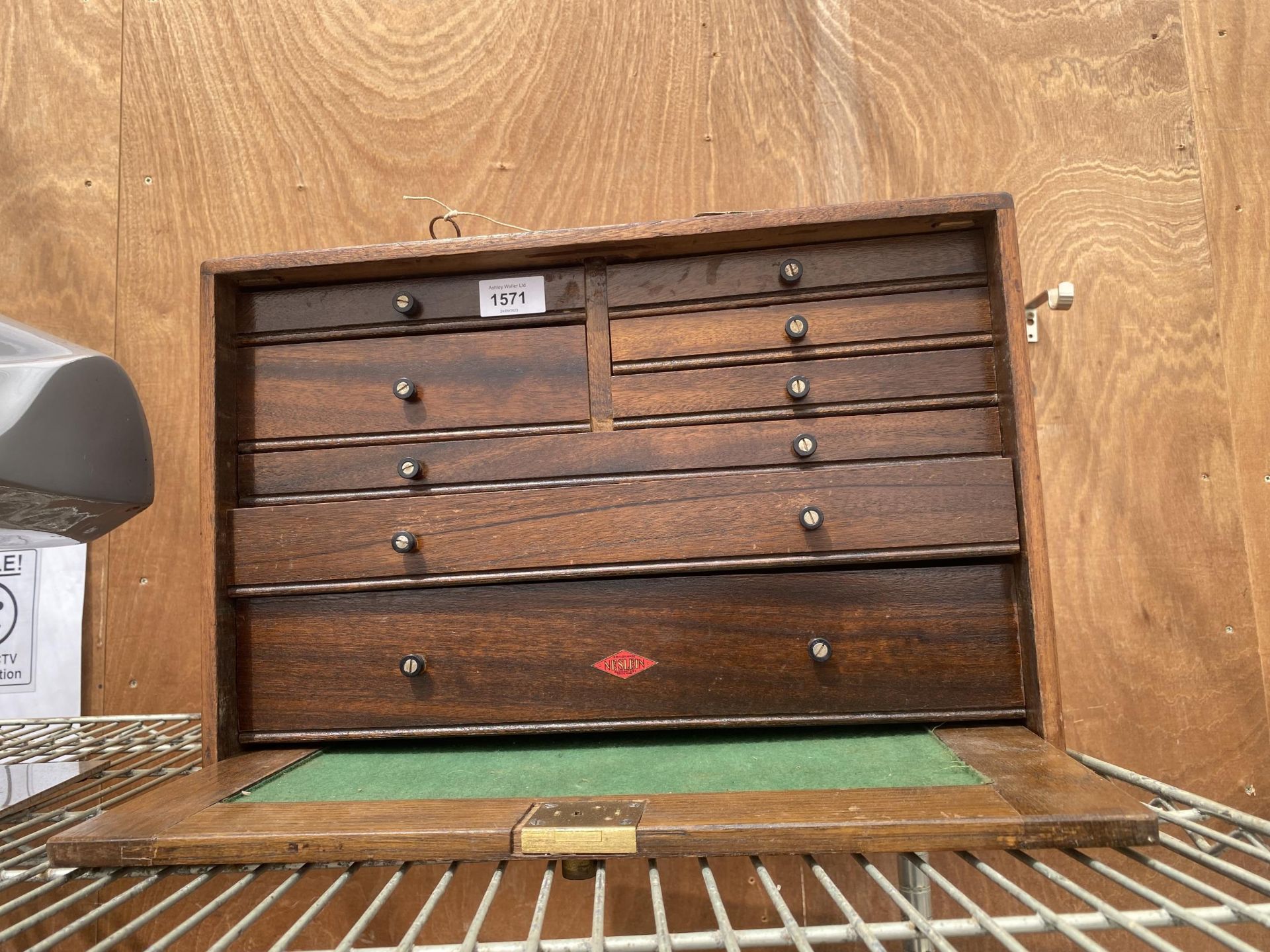 A VINTAGE WOODEN ENGINEERS CHEST WITH THREE LONG AND FIVE SHORT DRAWERS AND A DROP DOWN FRONT