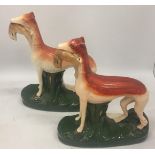 A PAIR OF STAFFORDSHIRE HUNTING DOGS, HEIGHT 28CM
