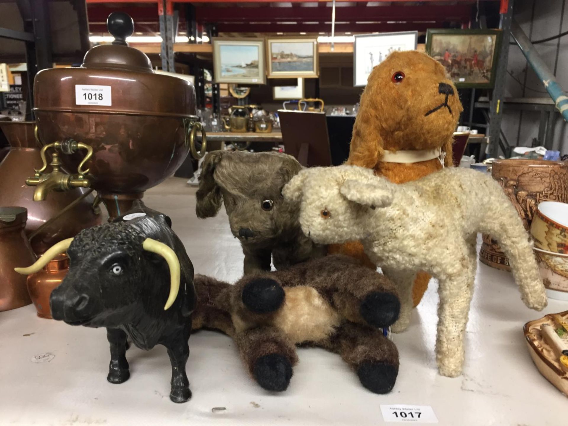 FOUR VINTAGE CUDDLY TOYS TO INCLUDE A DONKEY, TWO DOGS AND A LAMB - IN NEED OF T L C, PLUS A BULL