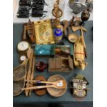 A LARGE QUANTITY OF TREEN ITEMS TO INCLUDE A BAROMETER, SWISS STYLE CLOCK AND HOUSE, A BOAT,