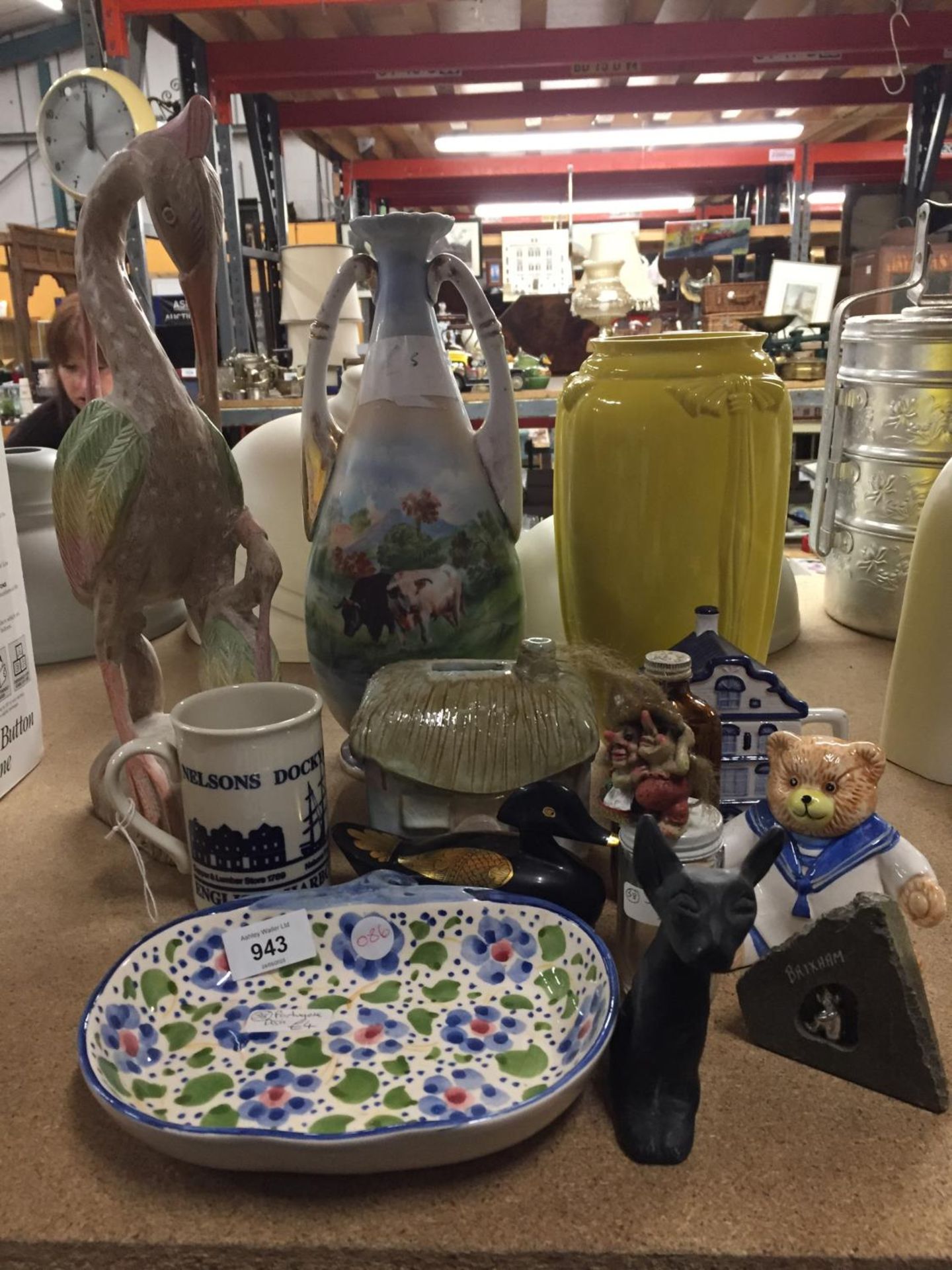 A MIXED LOT TO INCLUDE A VICTORIAN VASE WITH PASTORAL DESIGN, A LARGE WOODEN STORK, FIGURES, ETC