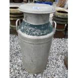 AN ALUMINIUM MILK CHURN WITH LID