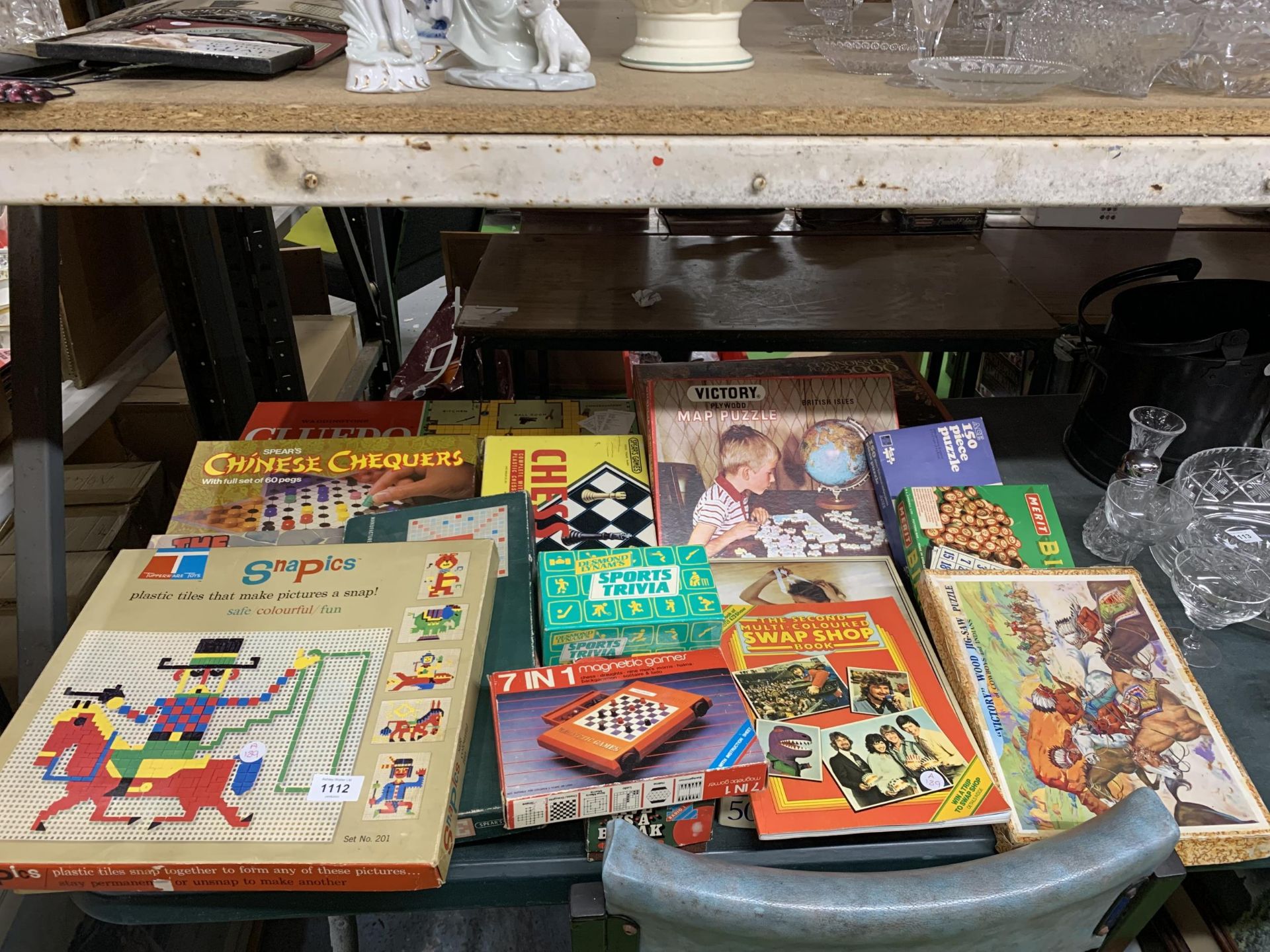 A MIXED GROUP OF BOXED PUZZLES AND FAMES, CHESS SET ETC