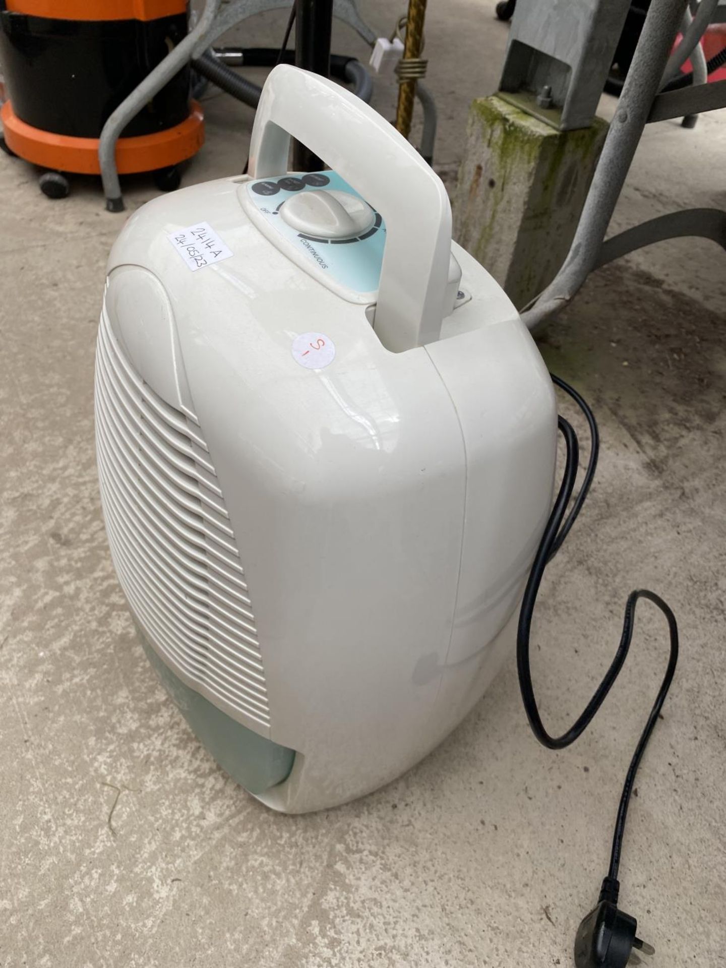 A DEHUMIDIFIER BELIEVED IN WORKING ORDER BUT NO WARRANTY GIVEN